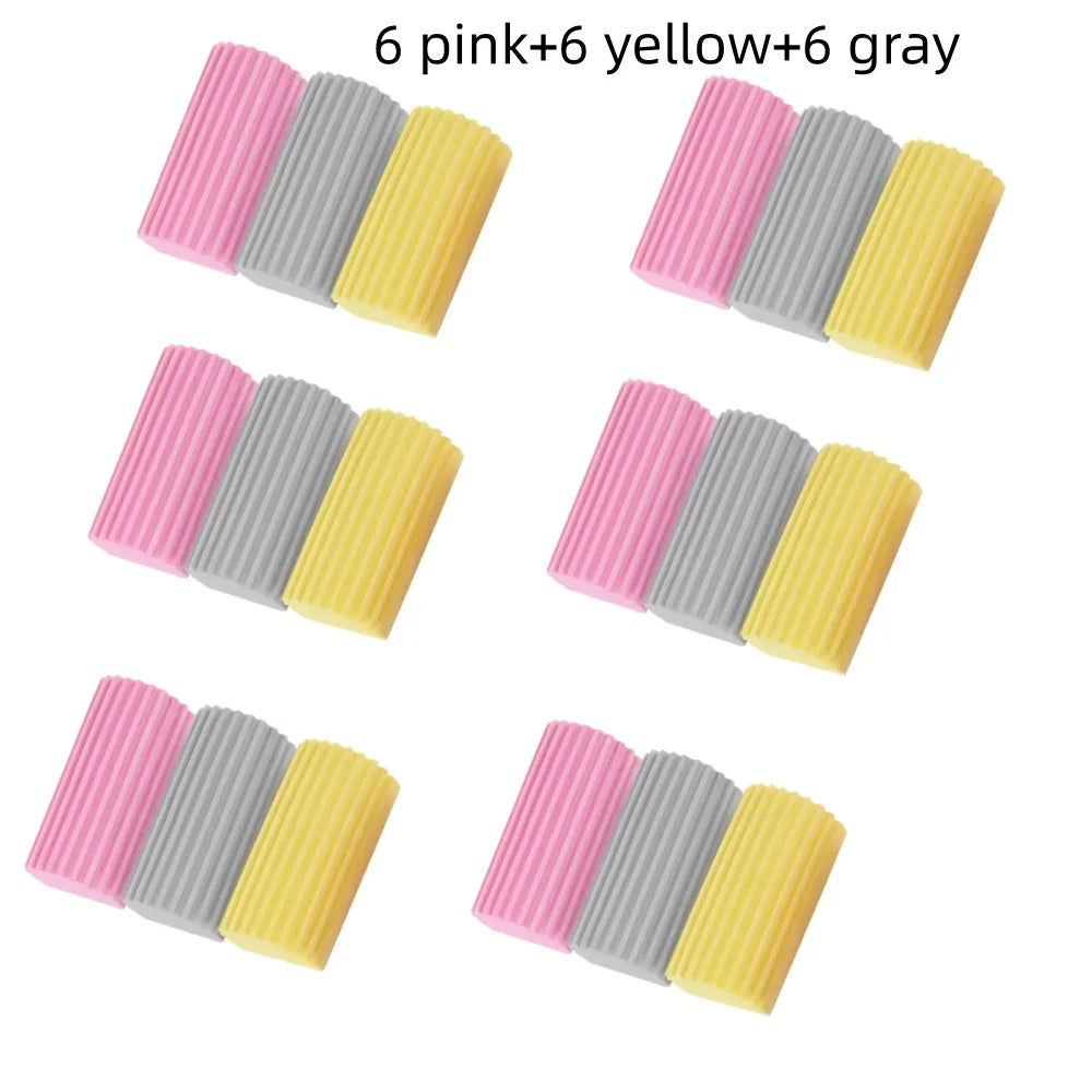 18 esponjas de limpieza PVA en rosa, amarillo y gris en tres filas.