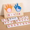 A wooden finger counting number learning toy showing handprints and mathematical equations like 9-1=8 and 9-1=?