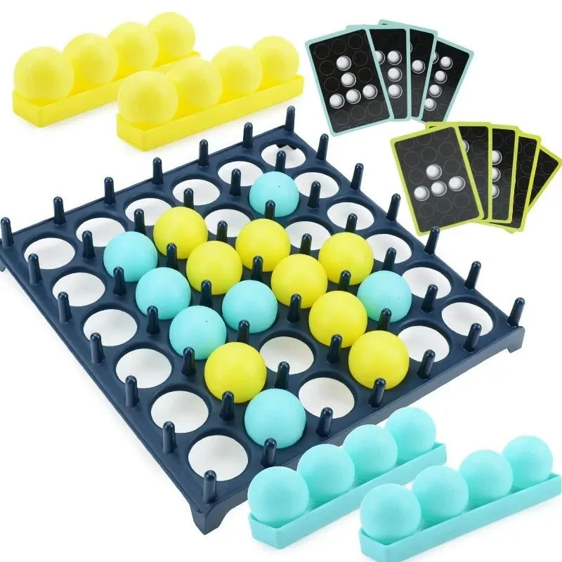 A set of yellow and blue bounce balls and cards for a tabletop game