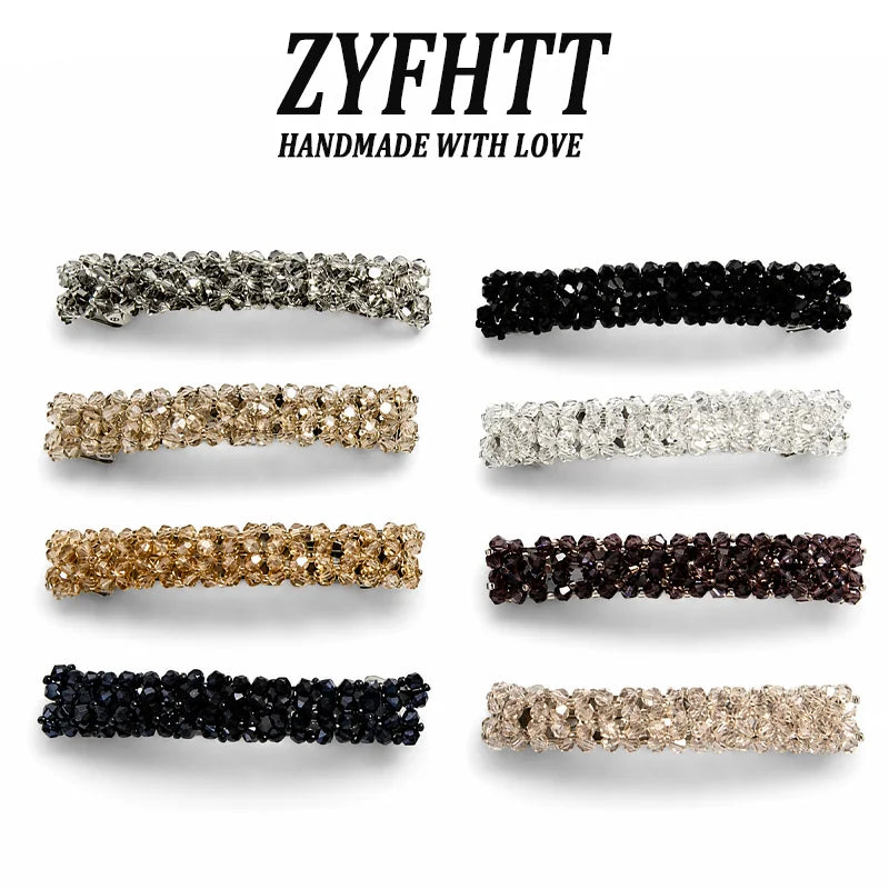 Colección de pinzas para el cabello artesanales con cristales en varios colores: negro, dorado, plateado y marrón.