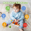 A toddler is engaging with a Montessori busy board featuring lights and sounds for sensory and fine motor skill development.