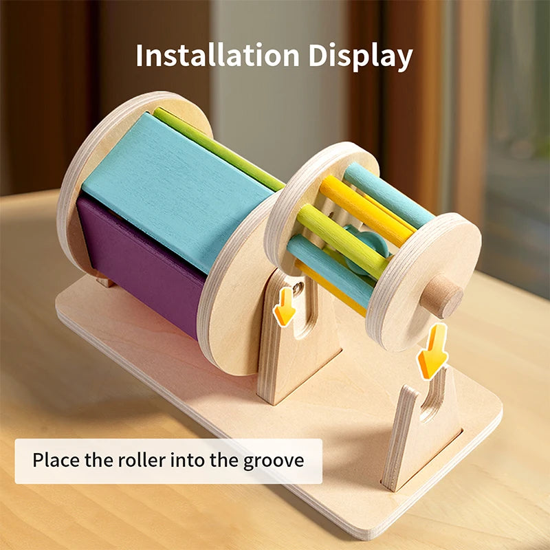 Montessori wooden spinning drum showing installation display with rollers placed in the groove
