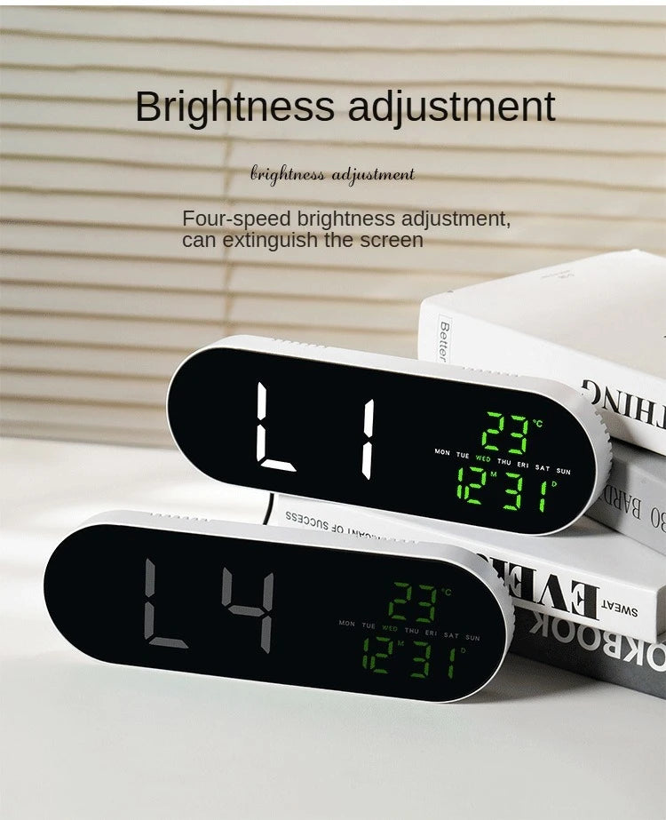 A black digital display showing brightness adjustment settings and a temperature reading on a white surface.
