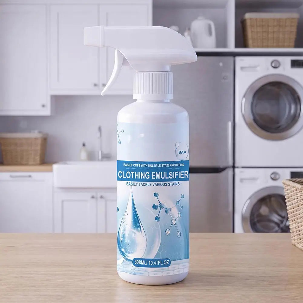 A white bottle of clothing emulsifier with a pump dispenser sits on a wooden table in a kitchen setting.
