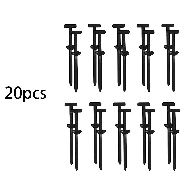 A set of ten black auto fender and trim panel cable tie buckles.