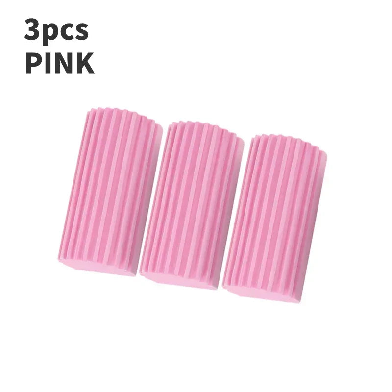 Tres esponjas de limpieza de PVA rosadas con estrías, mostradas una al lado de la otra.