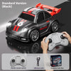 A black mini RC drift car is shown with a red body, next to its remote control and color box.