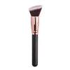 A professional makeup brush with a pink ferrule and black handle for foundation, concealer, and blush application.