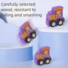 A purple wooden train set with a lion face is shown on a light blue surface, emphasizing its durability.