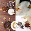 A collection of natural wooden scoops and bowls showing various ingredients like coffee beans, bath salts, and spices.