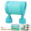 A teal marble run building blocks set with tracks and funnels shown in a coiled cylindrical shape.