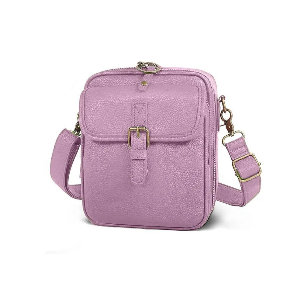 A mauve vintage vegan leather messenger bag with a gold-toned clasp and adjustable strap.