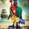A pirate parrot sculpture built from building blocks, featuring red and green colors on a wooden base.