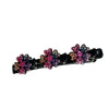 Clip de pelo negro con adornos florales morados y rosados