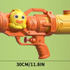 An orange water toy resembling a yellow dinosaur head is shown against a green background.