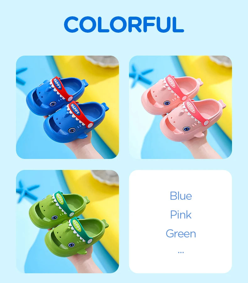 A collection of colorful kids shark clog sandals in blue, pink, and green shown on a hand.