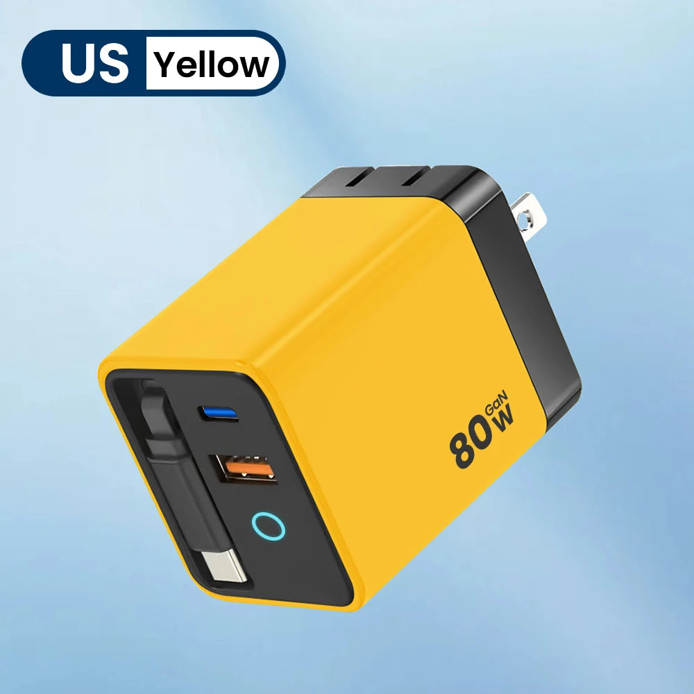 A yellow 80W USB-C fast charger with a black housing and retractable cable is shown against a light blue background.