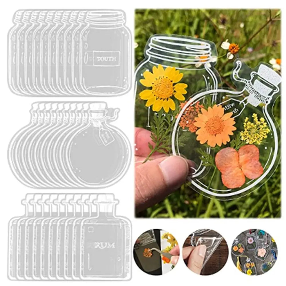 A set of thirty transparent glass jars filled with dried flowers used as DIY bookmarks.