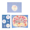 A colorful pop-up love tree card featuring a couple silhouette and floral elements.