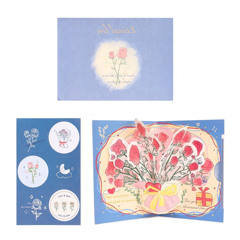 A colorful pop-up love tree card featuring a couple silhouette and floral elements.