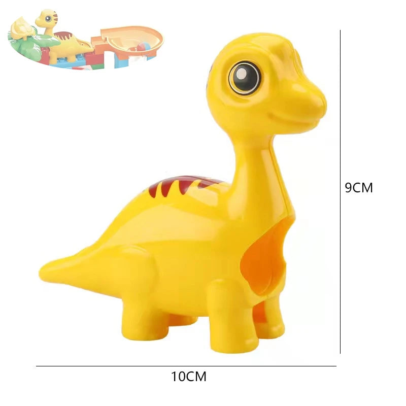 A yellow dinosaur-shaped marble run building block toy with tracks and funnels.