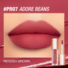 A close-up of a reddish brown matte lip tint product in a glass tube against a pink background.