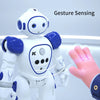 A white interactive robot arm with a hand, demonstrating gesture sensing for control.