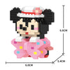 A micro building block figurine of a black cat wearing a pink hat and pink clothing.