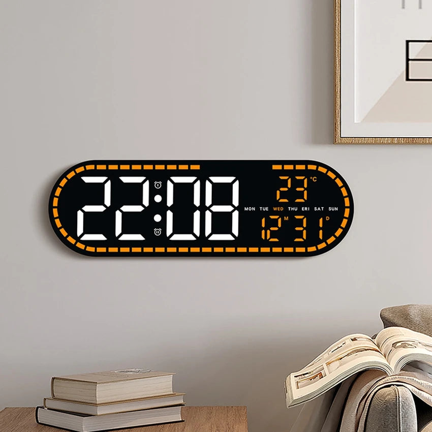 A large digital wall clock displaying the time 22:08, temperature 23°C, and the day of the week.