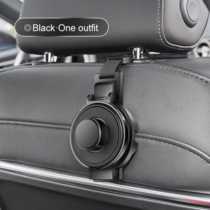 Gancho negro multipropósito para reposacabezas de auto con portavasos y organizador montado en asiento gris.