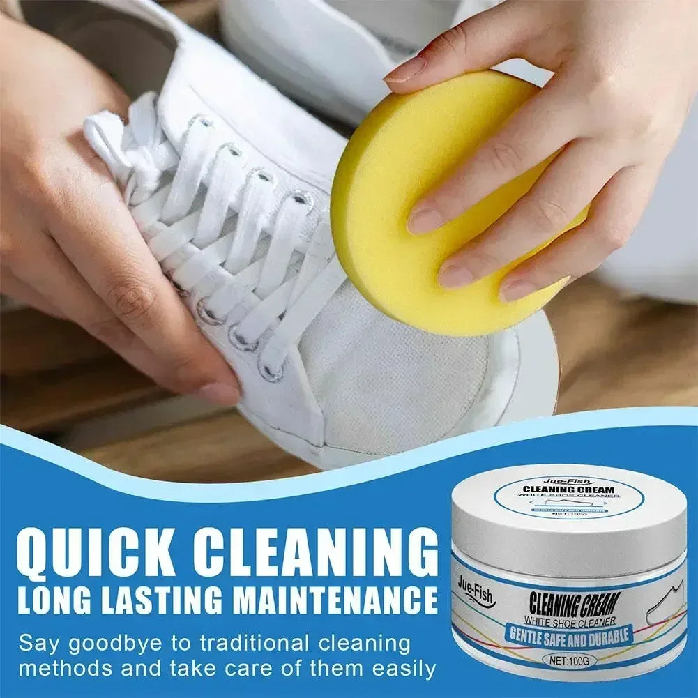 Hands are cleaning white sneakers with a yellow sponge and cream for easy shoe maintenance.