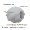 A white silicone mold for a rotating candle, showing dimensions of 60g weight and 8.6cm thickness.