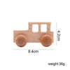 A light wood hand-pushed cart toy for toddlers with round wheels and a rectangular body.