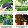 A solar firework lawn light is shown being used to light up a garden area at night.